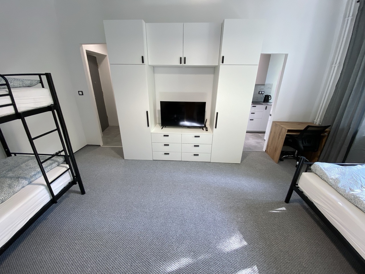 STUDIO FOR THREE PEOPLE