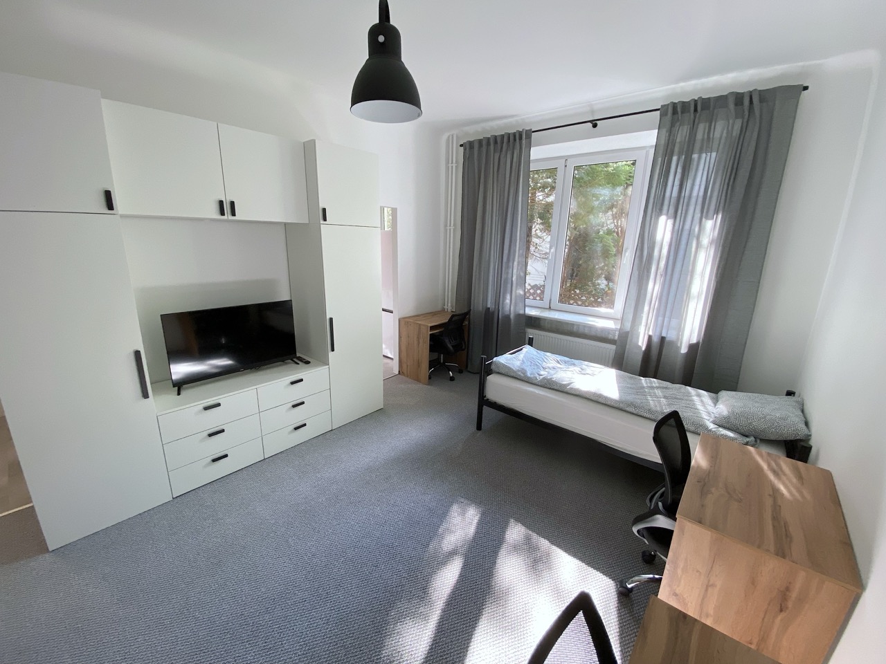 STUDIO FOR THREE PEOPLE
