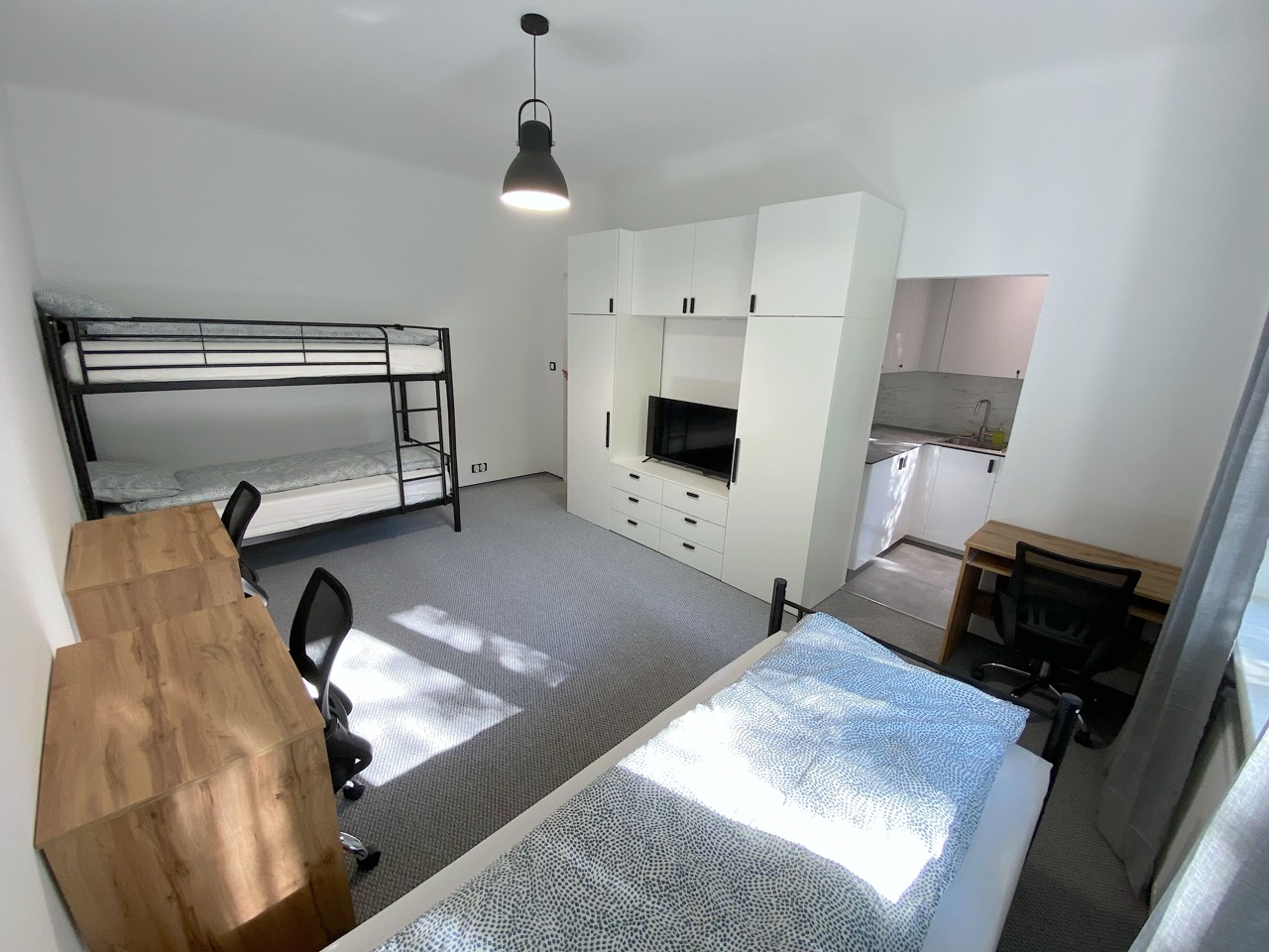 STUDIO FOR THREE PEOPLE
